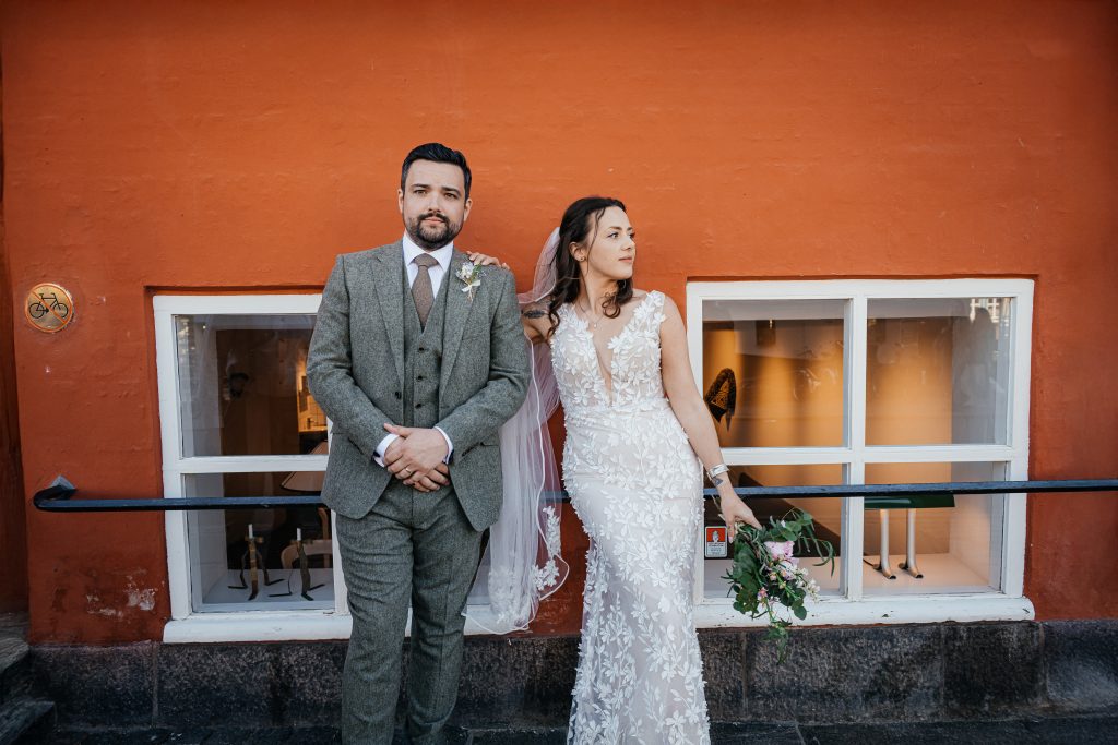 Sapphire and Max sharing a joyful wedding moment in Copenhagen